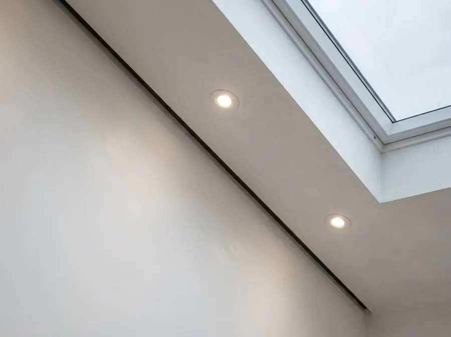 Insulated conservatory ceiling detail with roof window and downlights